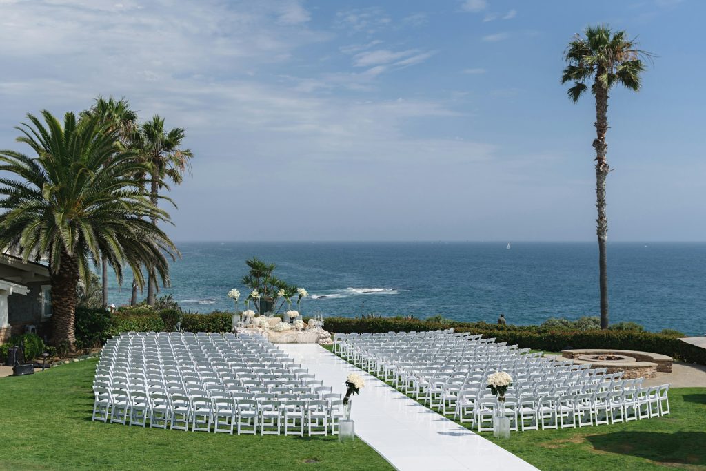 Tropical Destination Wedding 
A wedding set up on a lawn overlooking the ocean